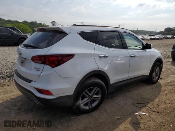 ✅ 2018 Hyundai Santa Fe 2.4L • VIN: 5XYZUDLBXJG542329 • Лот: 58935704. Опубликован ранее на Copart с пробегом 74 544 миль. Бесплатный доступ к архиву аукционных продаж из США и подробный отчёт об истории автомобиля на DreamBid. Изображение 3.