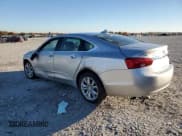 ✅ 2018 Chevrolet Impala LT • VIN: 1G1105SAXJU131477 • Lot: 89521875. Listed on Copart with 130,671 mi. Free auction sales archive from the USA and detailed vehicle history report at DreamBid. Image 2.