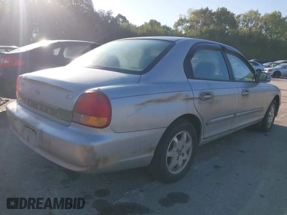 ✅ 2001 Hyundai Sonata GLS • VIN: KMHWF35V21A456068 • Лот: 43276808. Опубликован ранее на IAAI с пробегом 141 908 миль. Бесплатный доступ к архиву аукционных продаж из США и подробный отчёт об истории автомобиля на DreamBid. Изображение 4.
