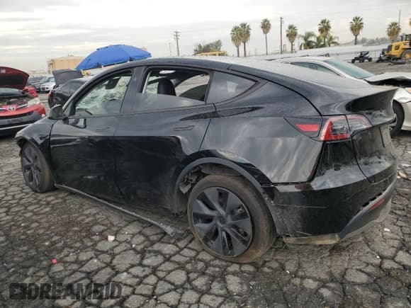 ✅ 2025 Tesla Model Y Long Range • VIN: 7SAYGDEE5SF264882 • Lot: 86113415. Wystawiony na Copart z przebiegiem Nie podano. Bezpłatny archiwum sprzedaży aukcyjnych z USA i szczegółowy raport historii pojazdu na DreamBid. Zdjęcie 2.