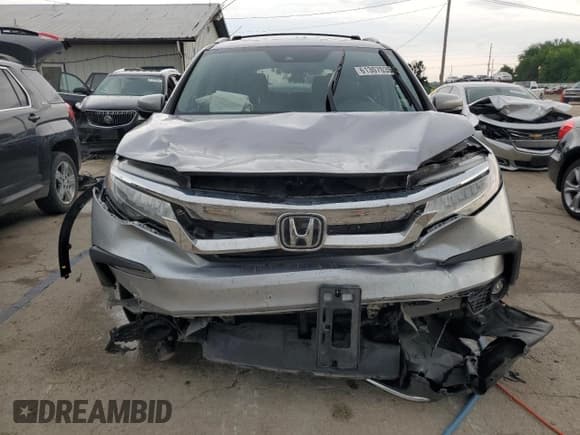 ✅ 2022 Honda Pilot Touring 7-Passenger • VIN: 5FNYF6H61NB019565 • Lot: 61307035. Listed on Copart with 75,932 mi. Free auction sales archive from the USA and detailed vehicle history report at DreamBid. Image 5.