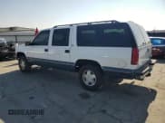✅ 1997 Chevrolet Suburban • VIN: 1GNFK16R1VJ339214 • Lot: 85410875. Wystawiony na Copart z przebiegiem 158 297 mil. Bezpłatny archiwum sprzedaży aukcyjnych z USA i szczegółowy raport historii pojazdu na DreamBid. Zdjęcie 2.