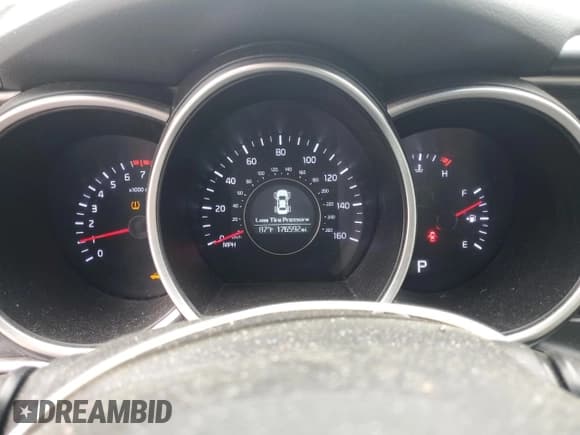 ✅ 2015 Kia Optima LX • VIN: 5XXGM4A70FG488749 • Лот: 57395825. Опубликован ранее на Copart с пробегом 176 592 миль. Бесплатный доступ к архиву аукционных продаж из США и подробный отчёт об истории автомобиля на DreamBid. Изображение 9.