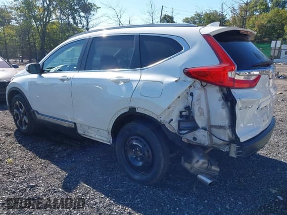 ✅ 2017 Honda CR-V Touring • VIN: 5J6RW2H93HL069080 • Лот: 43233920. Опубликован ранее на IAAI с пробегом 102 458 миль. Бесплатный доступ к архиву аукционных продаж из США и подробный отчёт об истории автомобиля на DreamBid. Изображение 3.