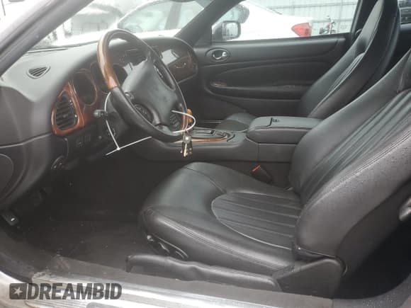 ✅ 2000 Jaguar XK • VIN: SAJJA41B6YPA01802 • Lot: 57146745. Listed on Copart with 32,208 mi. Free auction sales archive from the USA and detailed vehicle history report at DreamBid. Image 7.