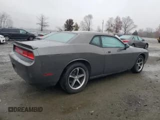 ✅ 2010 Dodge Challenger SE • VIN: 2B3CJ4DV7AH260157 • Lot: 93429425. Listed on Copart with 195,621 mi. Free auction sales archive from the USA and detailed vehicle history report at DreamBid. Image 3.