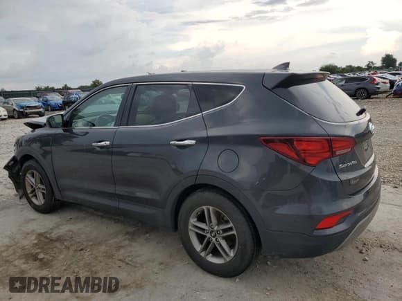 ✅ 2017 Hyundai Santa Fe 2.4L • VIN: 5XYZT3LB0HG469690 • Lot: 64802425. Listed on Copart with 169,198 mi. Free auction sales archive from the USA and detailed vehicle history report at DreamBid. Image 2.