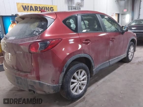 ✅ 2013 Mazda CX-5 Sport • VIN: JM3KE4BE7D0164630 • Lot: 41965600. Listed on IAAI with 157,879 mi. Free auction sales archive from the USA and detailed vehicle history report at DreamBid. Image 4.