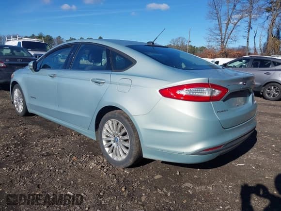 ✅ 2013 Ford Fusion SE Hybrid • VIN: 3FA6P0LU0DR206015 • Lot: 43771131. Listed on IAAI with 133,778 mi. Free auction sales archive from the USA and detailed vehicle history report at DreamBid. Image 3.