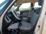 ✅ 2014 FIAT 500L Easy • VIN: ZFBCFABH4EZ023856 • Lot: 76285024. Listed on Copart with 131,343 mi. Free auction sales archive from the USA and detailed vehicle history report at DreamBid. Image 7.