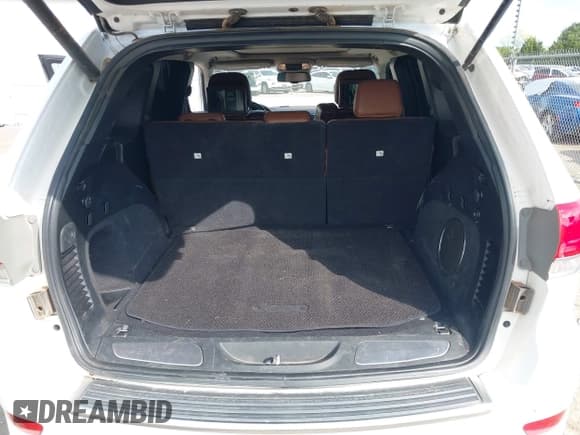 ✅ 2015 Jeep Grand Cherokee Summit • VIN: 1C4RJEJG5FC105296 • Lot: 43231201. Listed on IAAI with 124,311 mi. Free auction sales archive from the USA and detailed vehicle history report at DreamBid. Image 18.