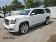 ✅ 2020 GMC Yukon XL SLT • VIN: 1GKS2GKC3LR276986 • Lot: 67738435. Listed on Copart with 183,924 mi. Free auction sales archive from the USA and detailed vehicle history report at DreamBid. Image 1.