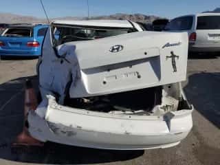 2003 Hyundai Accent GL с VIN KMHCG45C23U482563, выставлен на аукционе Copart как лот 58358165 с пробегом 125 838 миль миль и Списание • Salvage title. История ставок и продаж доступна на DreamBid. Изображение 6.