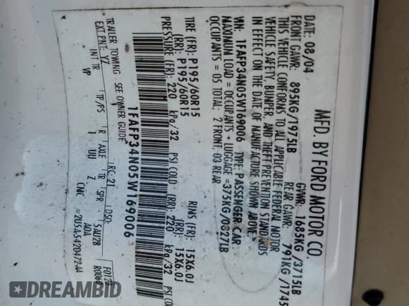 ✅ 2005 Ford Focus S • VIN: 1FAFP34N05W169006 • Lot: 92454825. Listed on Copart with Not provided. Free auction sales archive from the USA and detailed vehicle history report at DreamBid. Image 12.