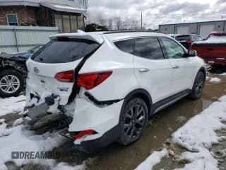 ✅ 2017 Hyundai Santa Fe Ultimate • VIN: 5XYZWDLA8HG472695 • Лот: 44179213. Опубликован ранее на Copart с пробегом 73 978 миль. Бесплатный доступ к архиву аукционных продаж из США и подробный отчёт об истории автомобиля на DreamBid. Изображение 3.