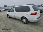 ✅ 2000 Toyota Sienna LE • VIN: 4T3ZF13C7YU243233 • Lot: 96838065. Listed on Copart with Not provided. Free auction sales archive from the USA and detailed vehicle history report at DreamBid. Image 2.