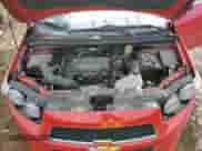 2013 Chevrolet Sonic RS z VIN 1G1JG6SB1D4150742, wystawiony jako Copart lot #88859145 z przebiegiem 96 024 mil mil oraz Czysty tytuł • Clean title. Historia ofert i sprzedaży dostępna na DreamBid. Obrazek 11.