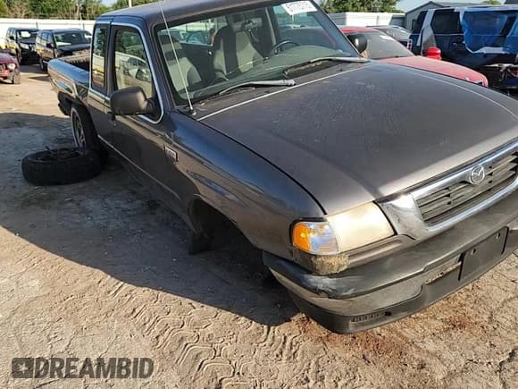 ✅ 2000 Mazda B-Series SE • VIN: 4F4YR16V0YTM26919 • Lot: 61775715. Listed on Copart with 218,184 mi. Free auction sales archive from the USA and detailed vehicle history report at DreamBid. Image 13.