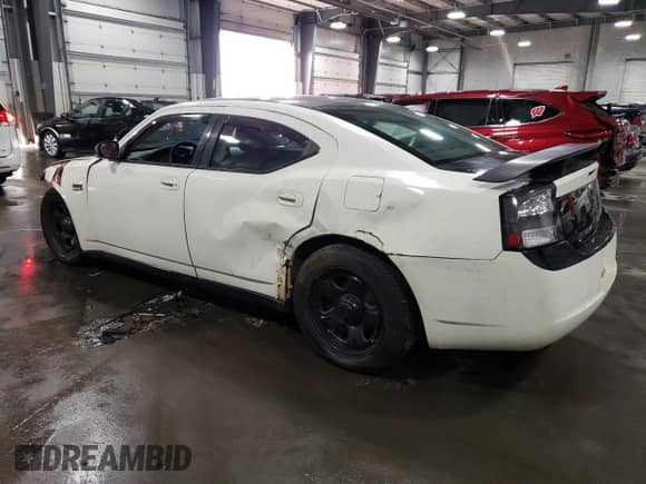 2009 Dodge Charger Police с VIN 2B3KA43T99H597615, выставлен на аукционе Copart как лот 75671074 с пробегом 199 004 миль миль и Списание • Salvage title. История ставок и продаж доступна на DreamBid. Изображение 2.