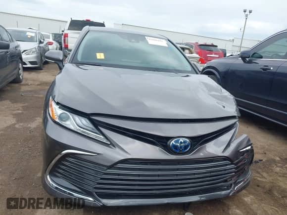 2022 Toyota Camry Hybrid XLE with VIN 4T1F31AK0NU589375, listed as a IAAI auction lot 42600441 with 28,781 mi miles and . Bid and sale history available at DreamBid. Image 12.