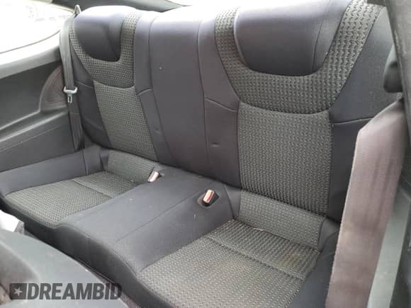 2012 Hyundai Genesis Coupe 2.0T z VIN KMHHT6KD9CU065547, wystawiony jako Copart lot #69850284 z przebiegiem 112 246 mil mil oraz Szkoda całkowita • Salvage title. Historia ofert i sprzedaży dostępna na DreamBid. Obrazek 10.