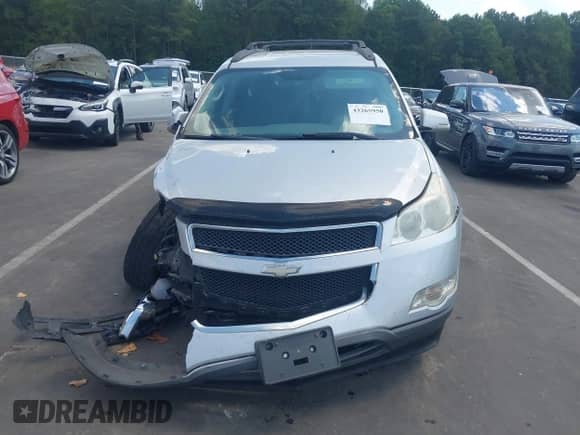 2011 Chevrolet Traverse 1LT z VIN 1GNKRGED0BJ389472, wystawiony jako IAAI lot #43265950 z przebiegiem 203 318 mil mil oraz . Historia ofert i sprzedaży dostępna na DreamBid. Obrazek 12.