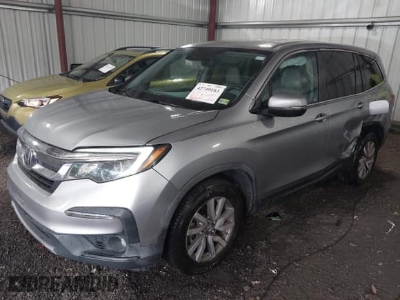 ✅ 2019 Honda Pilot EX-L • VIN: 5FNYF5H52KB034928 • Lot: 42749183. Listed on IAAI with 82,661 mi. Free auction sales archive from the USA and detailed vehicle history report at DreamBid. Image 2.