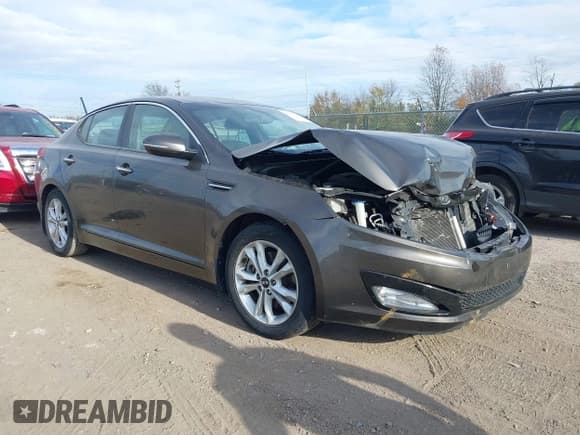 ✅ 2011 Kia Optima EX • VIN: KNAGN4A60B5142149 • Lot: 40758358. Listed on IAAI with 151,166 mi. Free auction sales archive from the USA and detailed vehicle history report at DreamBid. Image 1.