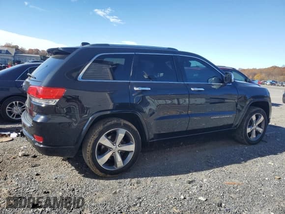 ✅ 2014 Jeep Grand Cherokee Overland • VIN: 1C4RJFCG3EC272614 • Lot: 89529875. Listed on Copart with 121,117 mi. Free auction sales archive from the USA and detailed vehicle history report at DreamBid. Image 3.