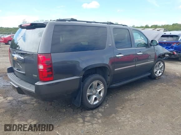✅ 2011 Chevrolet Suburban LTZ • VIN: 1GNSKKE38BR169495 • Lot: 43372468. Listed on IAAI with 119,937 mi. Free auction sales archive from the USA and detailed vehicle history report at DreamBid. Image 4.