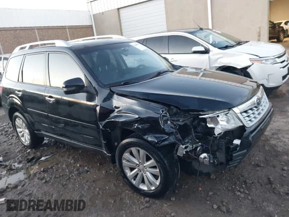 ✅ 2012 Subaru Forester X Touring • VIN: JF2SHBGC9CH447527 • Лот: 41444334. Опубликован ранее на IAAI с пробегом 94 975 миль. Бесплатный доступ к архиву аукционных продаж из США и подробный отчёт об истории автомобиля на DreamBid. Изображение 13.