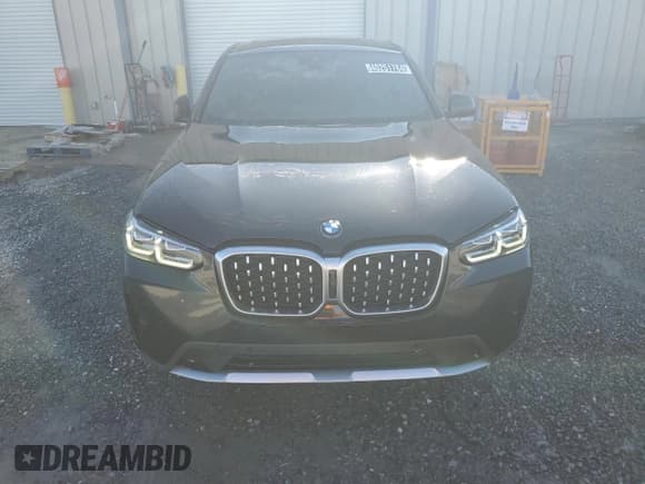 ✅ 2022 BMW X4 xDrive30i • VIN: 5UX33DT05N9M86605 • Lot: 40251784. Wystawiony na Copart z przebiegiem 38 430 mil. Bezpłatny archiwum sprzedaży aukcyjnych z USA i szczegółowy raport historii pojazdu na DreamBid. Zdjęcie 5.