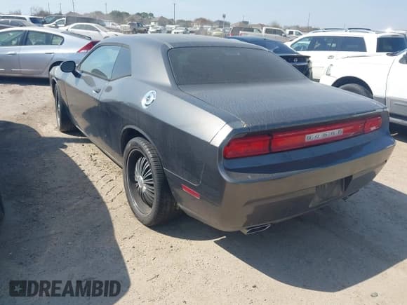 ✅ 2013 Dodge Challenger Rallye Redline • VIN: 2C3CDYAG7DH670128 • Lot: 41588960. Wystawiony na IAAI z przebiegiem 188 945 mil. Bezpłatny archiwum sprzedaży aukcyjnych z USA i szczegółowy raport historii pojazdu na DreamBid. Zdjęcie 3.