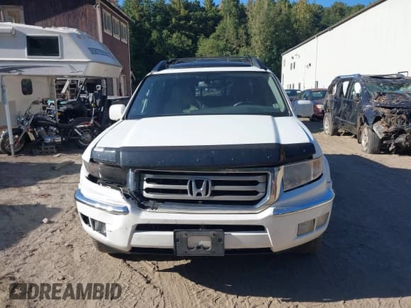 ✅ 2014 Honda Ridgeline RTL • VIN: 5FPYK1F52EB002547 • Лот: 43357992. Опубликован ранее на IAAI с пробегом 140 520 миль. Бесплатный доступ к архиву аукционных продаж из США и подробный отчёт об истории автомобиля на DreamBid. Изображение 12.