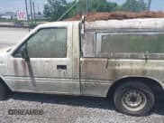 ✅ 1992 Isuzu Pickup S • VIN: 4S1CL11L3N4207154 • Lot: 42470949. Wystawiony na IAAI z przebiegiem 309 488 mil. Bezpłatny archiwum sprzedaży aukcyjnych z USA i szczegółowy raport historii pojazdu na DreamBid. Zdjęcie 14.