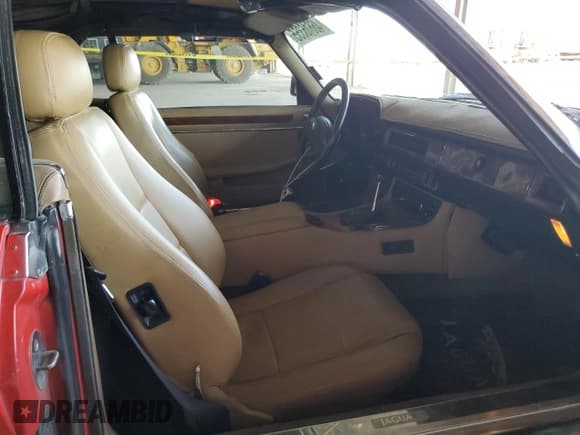 ✅ 1989 Jaguar XJS • VIN: SAJNV4848KC157851 • Лот: 46616355. Опубликован ранее на Copart с пробегом 34 125 миль. Бесплатный доступ к архиву аукционных продаж из США и подробный отчёт об истории автомобиля на DreamBid. Изображение 7.