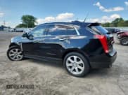 ✅ 2014 Cadillac SRX Premium Collection • VIN: 3GYFNDE31ES580133 • Lot: 84463685. Listed on Copart with 151,152 mi. Free auction sales archive from the USA and detailed vehicle history report at DreamBid. Image 2.