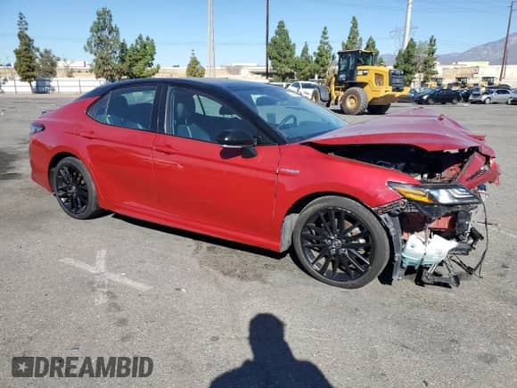 2021 Toyota Camry Hybrid XSE с VIN 4T1K31AK6MU022259, выставлен на аукционе Copart как лот 70696655 с пробегом 155 767 миль миль и Списание • Salvage title. История ставок и продаж доступна на DreamBid. Изображение 4.