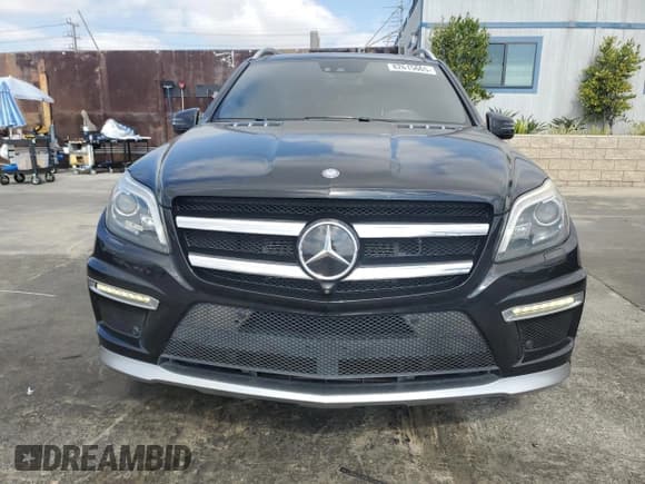 ✅ 2015 Mercedes-Benz GL 63 AMG • VIN: 4JGDF7EE9FA445980 • Lot: 82615665. Listed on Copart with 128,834 mi. Free auction sales archive from the USA and detailed vehicle history report at DreamBid. Image 5.