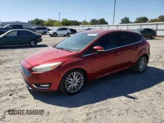 ✅ 2016 Ford Focus Titanium • VIN: 1FADP3N29GL330551 • Лот: 68920295. Опубликован ранее на Copart с пробегом 179 651 миль. Бесплатный доступ к архиву аукционных продаж из США и подробный отчёт об истории автомобиля на DreamBid. Изображение 1.