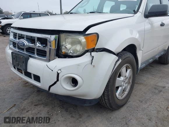 ✅ 2010 Ford Escape XLS • VIN: 1FMCU0C79AKD06626 • Lot: 43894952. Listed on IAAI with 99,581 mi. Free auction sales archive from the USA and detailed vehicle history report at DreamBid. Image 6.