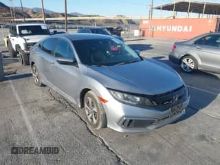 ✅ 2020 Honda Civic LX • VIN: 19XFC2F61LE205086 • Lot: 43149695. Listed on IAAI with 47,200 mi. Free auction sales archive from the USA and detailed vehicle history report at DreamBid. Image 1.