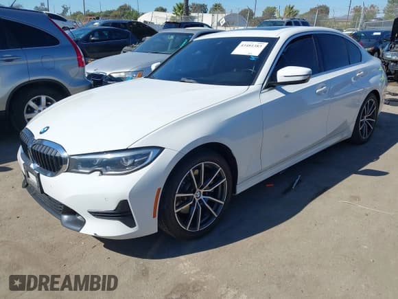 ✅ 2021 BMW 3 Series 330i • VIN: 3MW5R1J03M8B88795 • Lot: 43481383. Listed on IAAI with 62,929 mi. Free auction sales archive from the USA and detailed vehicle history report at DreamBid. Image 2.