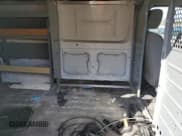 ✅ 2013 Nissan NV S • VIN: 1N6BF0KL0DN108218 • Лот: 47855005. Опубликован ранее на Copart с пробегом 173 392 миль. Бесплатный доступ к архиву аукционных продаж из США и подробный отчёт об истории автомобиля на DreamBid. Изображение 10.