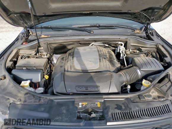 2022 Dodge Durango R/T with VIN 1C4SDHCT5NC101641, listed as a Copart auction lot 67034185 with 76,923 mi miles and Salvage title. Bid and sale history available at DreamBid. Image 12.