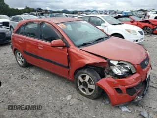 ✅ 2006 Kia Rio SX • VIN: KNADE163766094830 • Лот: 83930375. Опубликован ранее на Copart с пробегом 251 609 миль. Бесплатный доступ к архиву аукционных продаж из США и подробный отчёт об истории автомобиля на DreamBid. Изображение 4.