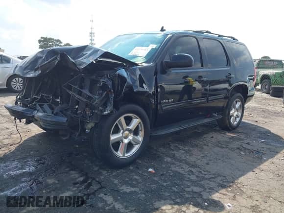 2012 Chevrolet Tahoe LT z VIN 1GNSCBE06CR215264, wystawiony jako IAAI lot #43274793 z przebiegiem 245 873 mil mil oraz . Historia ofert i sprzedaży dostępna na DreamBid. Obrazek 20.