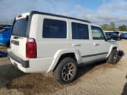 ✅ 2009 Jeep Commander Sport • VIN: 1J8HG48K79C541353 • Lot: 83828235. Listed on Copart with 128,347 mi. Free auction sales archive from the USA and detailed vehicle history report at DreamBid. Image 3.