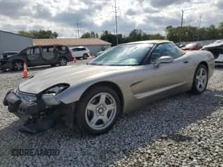 1999 Chevrolet Corvette z VIN 1G1YY32G6X5127333, wystawiony jako Copart lot #83806235 z przebiegiem 64 828 mil mil oraz Szkoda całkowita • Salvage title. Historia ofert i sprzedaży dostępna na DreamBid. Obrazek 1.
