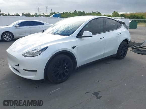 ✅ 2020 Tesla Model Y Long Range • VIN: 5YJYGDEE7LF056212 • Lot: 43565121. Listed on IAAI with 48,869 mi. Free auction sales archive from the USA and detailed vehicle history report at DreamBid. Image 22.